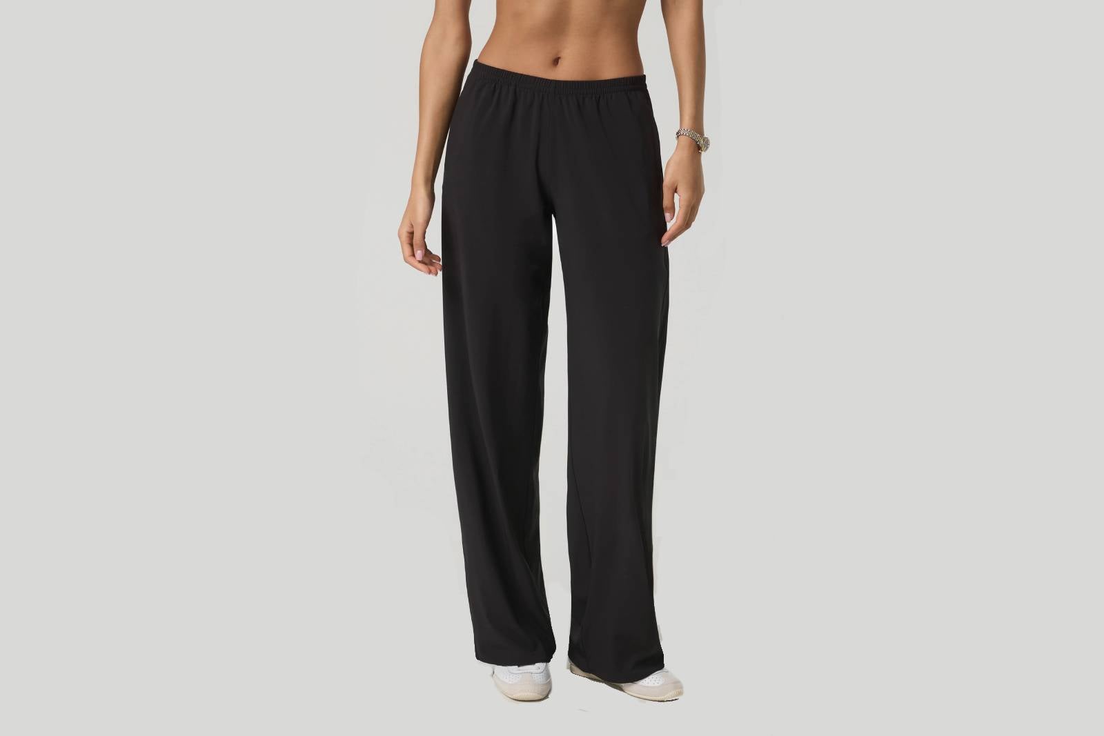 Woman wearing black wide leg pants