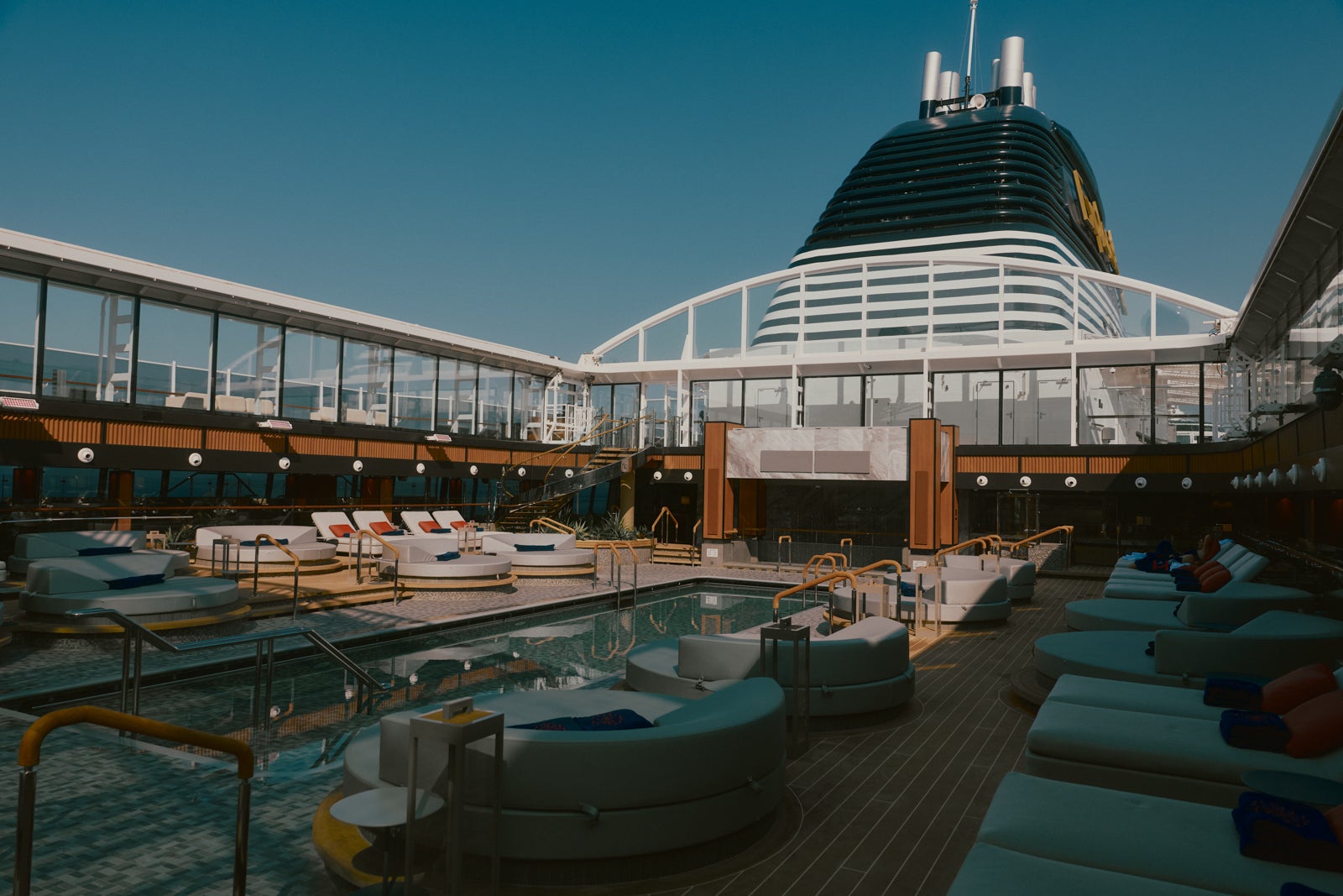 The pool deck of an Explora Journeys ship.