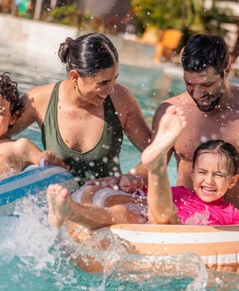 family in pool