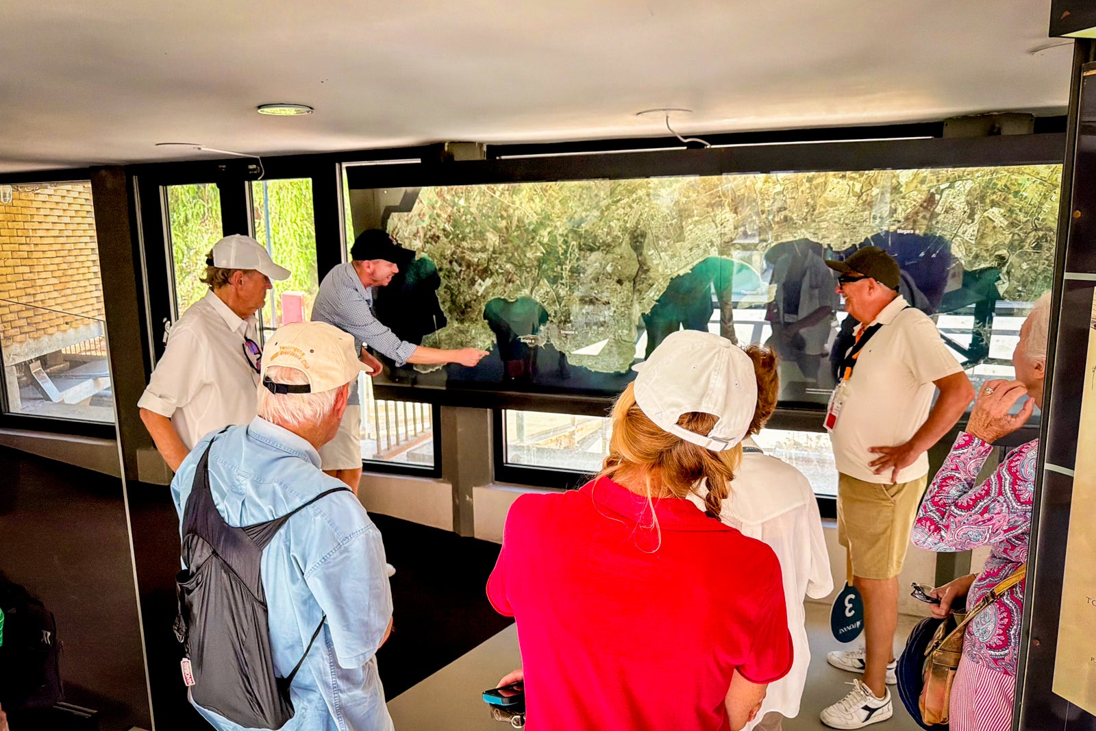 Archeologist Robert Stephan discussing the Peloponnesian War during a visit to an archeology museum in Syracuse.