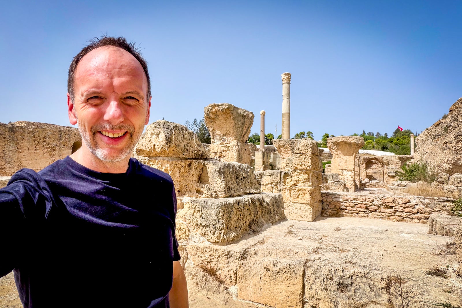 TPG's Gene Sloan during a visit to the ruins of ancient Carthage.