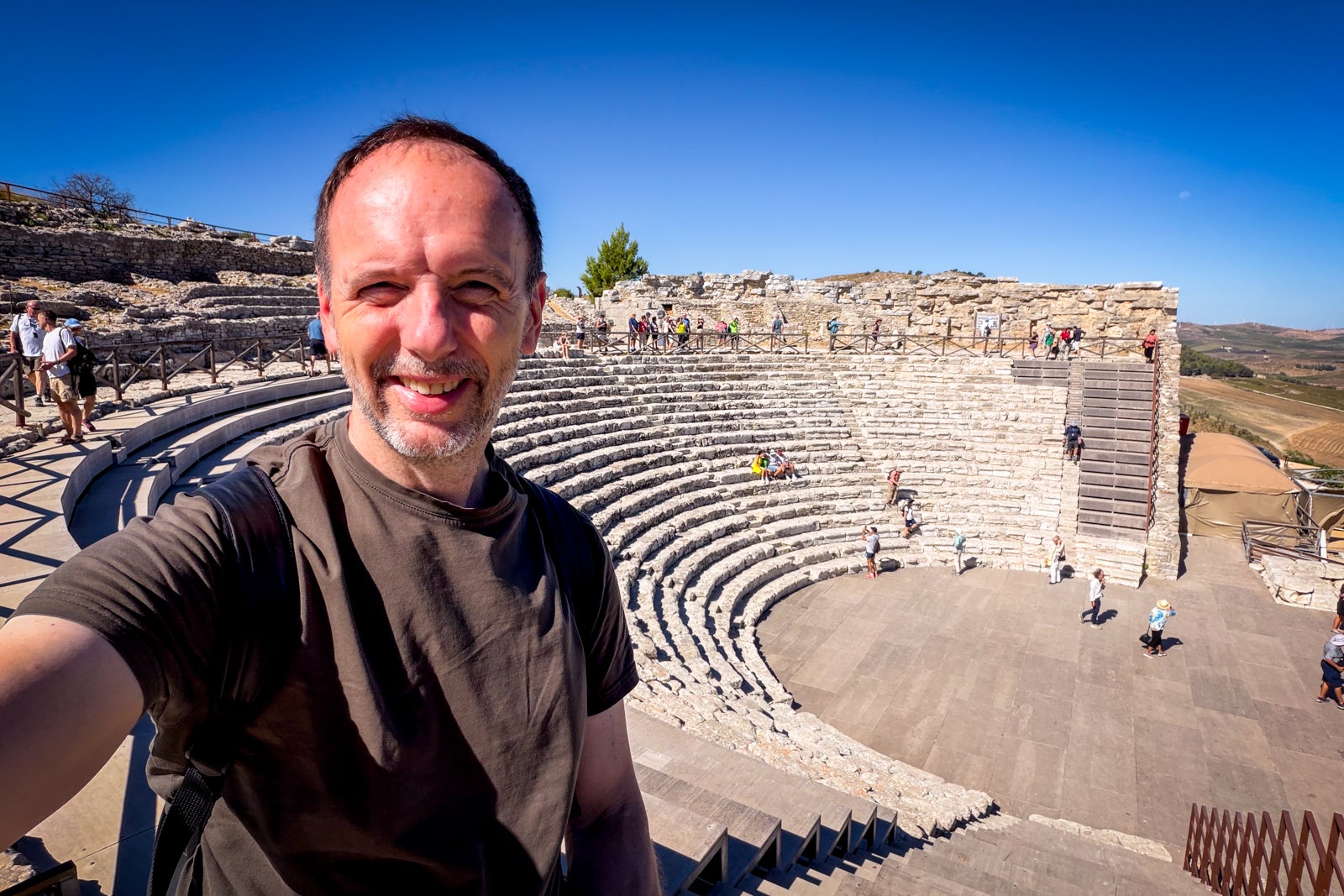 TPG's Gene Sloan at the ancient Greek theater of Segesta, which is still used for performances.